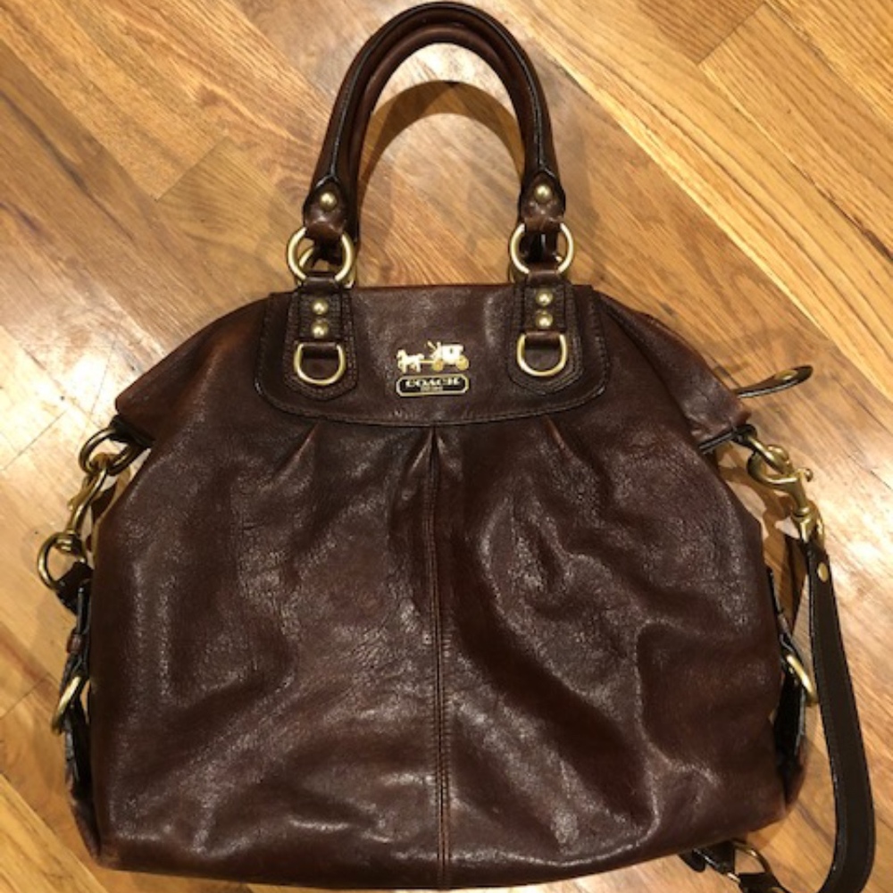 Brown leather Coach cross body purse